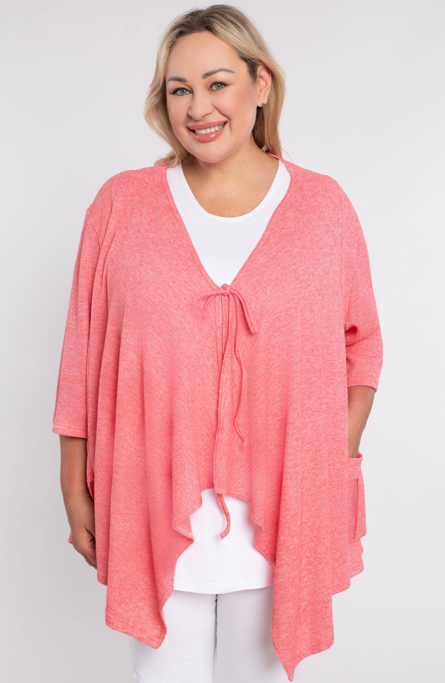 Różowy sweter z kieszenią